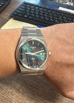 Фото покупателя: Швейцарские наручные часы Tissot PRX T137.410.11.091.00